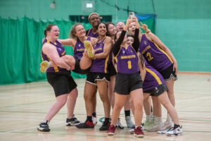 Women's Basketball taking selfie after fixture
