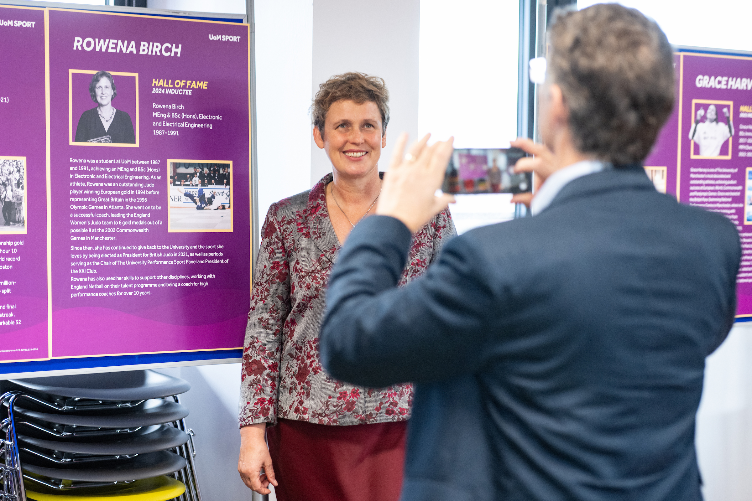 UoM Sport - Scholarship Awards. Rowena Birch poses with her Hall of Fame display